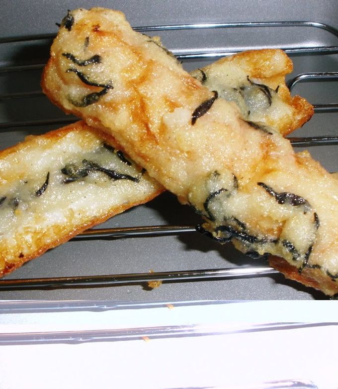 A picture of Fried Chikuwa Fishcake Sticks and Hijiki Seaweed using Flour and Potato.