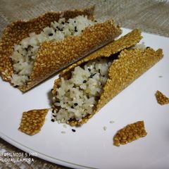 A picture of Sesame Nachos with sesame fried rice.