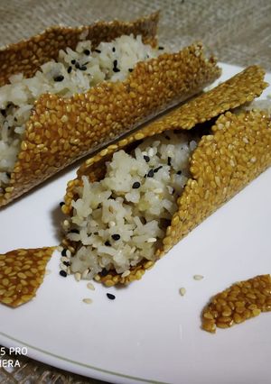 A picture of Sesame Nachos with sesame fried rice.