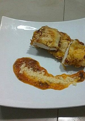 Una foto de Milanesa de pollo en salsa pomodoró😍😘