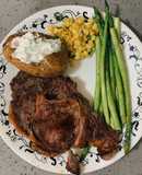 Bò steak + măng Tây áp chảo + bắp xào + khoai nướng