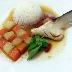 A picture of LG POACHED SALMON WITH POTATO AND CARROT IN ESSENCE OF CHICKEN BROTH.