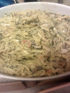 A picture of Shrimp spinich Fettuccini alfredo.