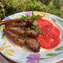 A picture of Air Fried Lamb Cutlets with Tomato Salad.