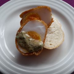 A picture of Sig's Crispy Duck Egg with Herb, Honey and Mustard Sauce.