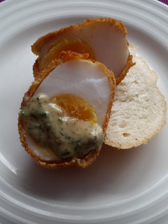 A picture of Sig's Crispy Duck Egg with Herb, Honey and Mustard Sauce.