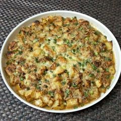 A picture of Baked Potato & Chicken with Basil, Thyme & Cheese.