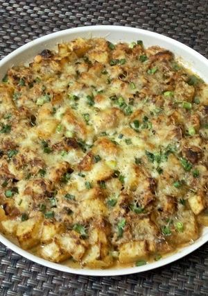 A picture of Baked Potato & Chicken with Basil, Thyme & Cheese.
