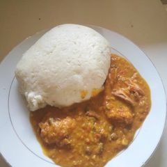 A picture of Tuwon shinkafa and gbegiri soup.