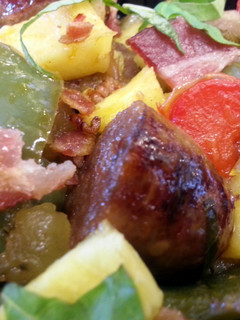 A picture of Sausage & Peppers w/ Bacon.