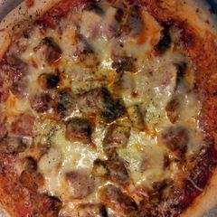 A picture of Chicken Parm. Pizza.