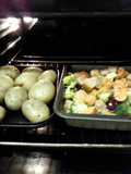 Cheaters guide to Garlic'd sausage casserole in a plum sauce with mini jackets and seasonal veg.