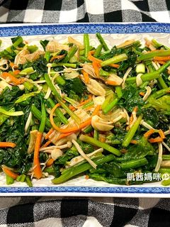 A picture of Stir-Fried Spinach and Enoki Mushrooms with Shacha Sauce.