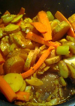 A picture of potato medallions and carrot planks.