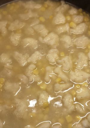 A picture of chicken corn soup.