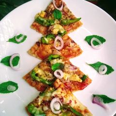A picture of Roti pizza(leftover chapati).