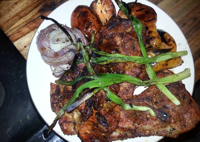 Grilled pork steaks with grilled veggies