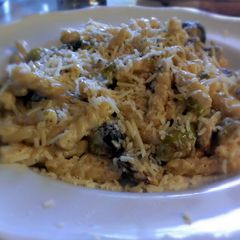 A picture of Roasted brussel sprouts with pasta.