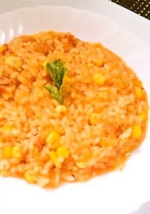 A picture of Tomato Risotto from Uncooked Rice.