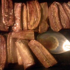 brown sugar glazed baked plantains A picture of brown sugar glazed baked plantains.