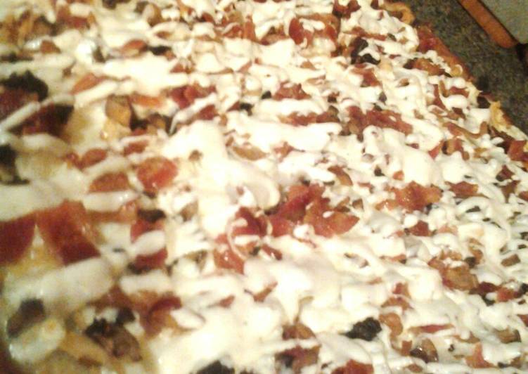 Steps to Prepare Award-winning Roasted chicken, sauteed mushrooms, fresh mozzarella and bacon ranch pizza