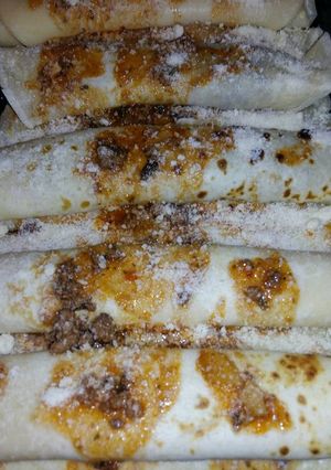 Una foto de Canelones caseritos de carne, jamón y queso