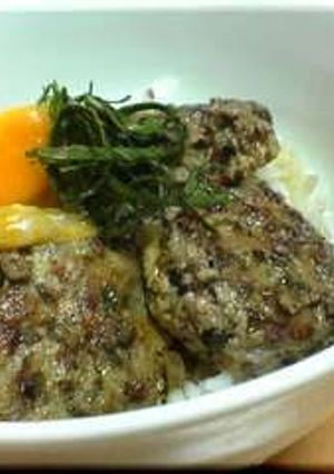 A picture of Chicken Meatball Rice Bowl With Soft-Poached Egg.