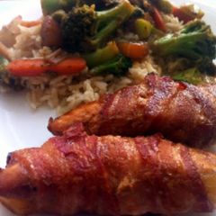 A picture of stuffed baccon chicken breast.