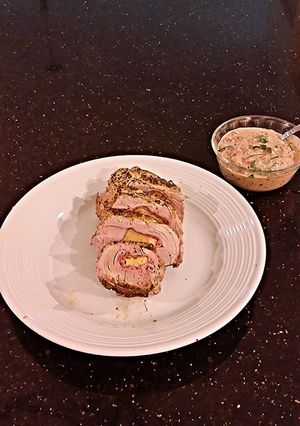 A picture of Pork Tenderloin Stuffed with Italian Meats.