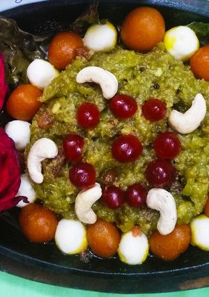 A picture of Sizzling dudhi halwa with mini gulab jamun and rasgulla.