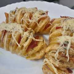 Una foto de Patatas con bacon y queso