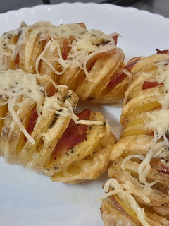 Una foto de Patatas con bacon y queso