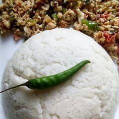 A picture of Ugali served with eggs.