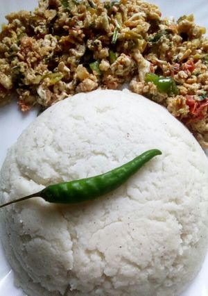 A picture of Ugali served with eggs.