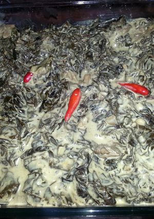 A picture of spicy tuna laing / taro leaves in coconut milk.