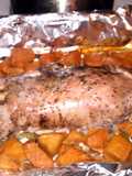marinated pork tenderloin pepercorn and garlic with sliced sweet potatos