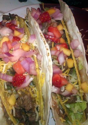 A picture of strawberry mango steak tacos.