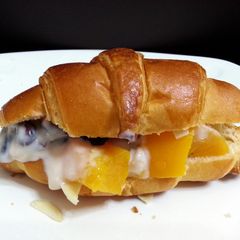 A picture of Peach Parfait On Croissant Breakfast.