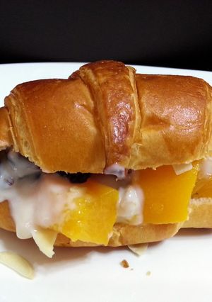A picture of Peach Parfait On Croissant Breakfast.