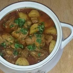 A picture of Aloo gosht shorba.
