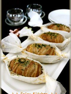 A picture of Easy Meat Wrapped Cheese Onigiri Using Kitchen Parchment Paper.