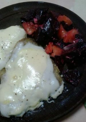 Una foto de Milanesas a la suiza