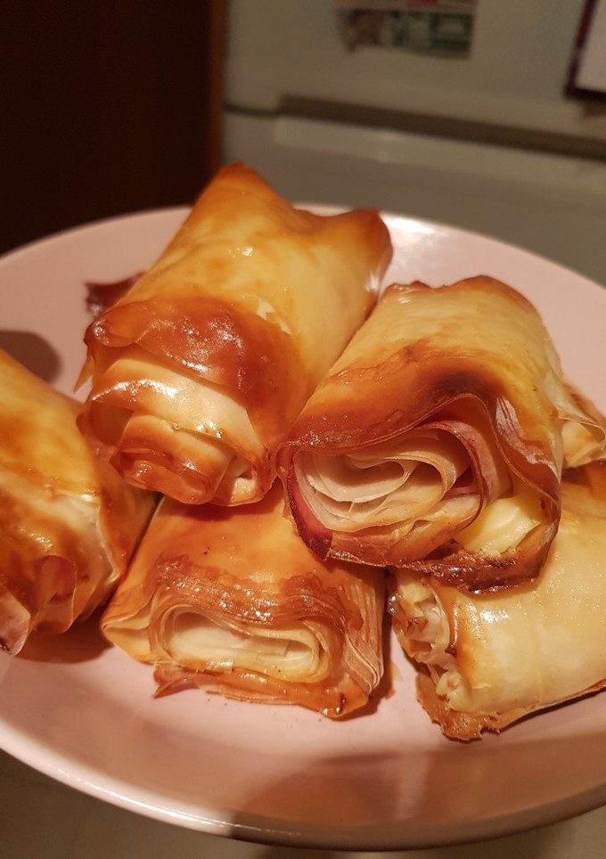 Una foto de Rollitos de jamón y queso