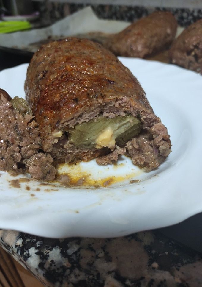 Una foto de Rollo de carne relleno de berenjena y queso