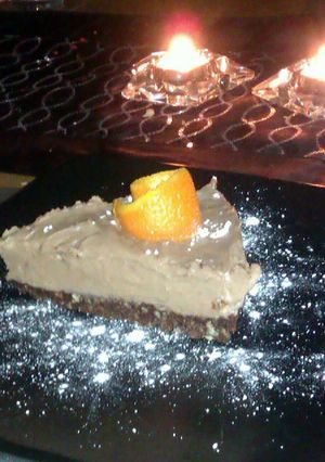 A picture of chocolate orange cheesecake with popping candy.
