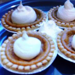 A picture of pumpkin pie tarts.