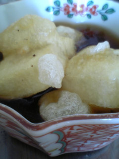 A picture of Warm Deep-Fried Mochi with Thick Ankake Sauce.