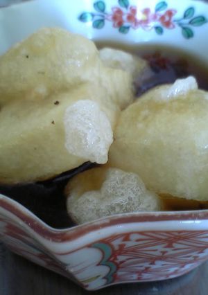A picture of Warm Deep-Fried Mochi with Thick Ankake Sauce.