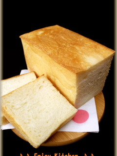A picture of Soft and Fluffy Rich Shokupan (Square Bread Loaf) With Cream.