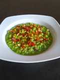 Risotto ai broccoli crumble di pane piccante e prosciutto crudo